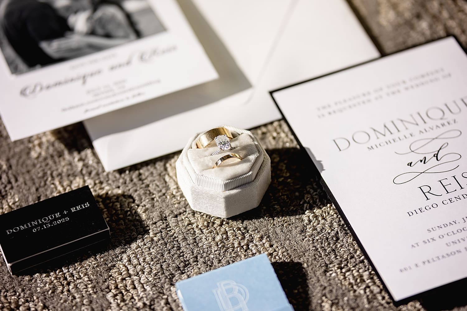 three rings in cream velvet ring box by Desiree Ashley Photography