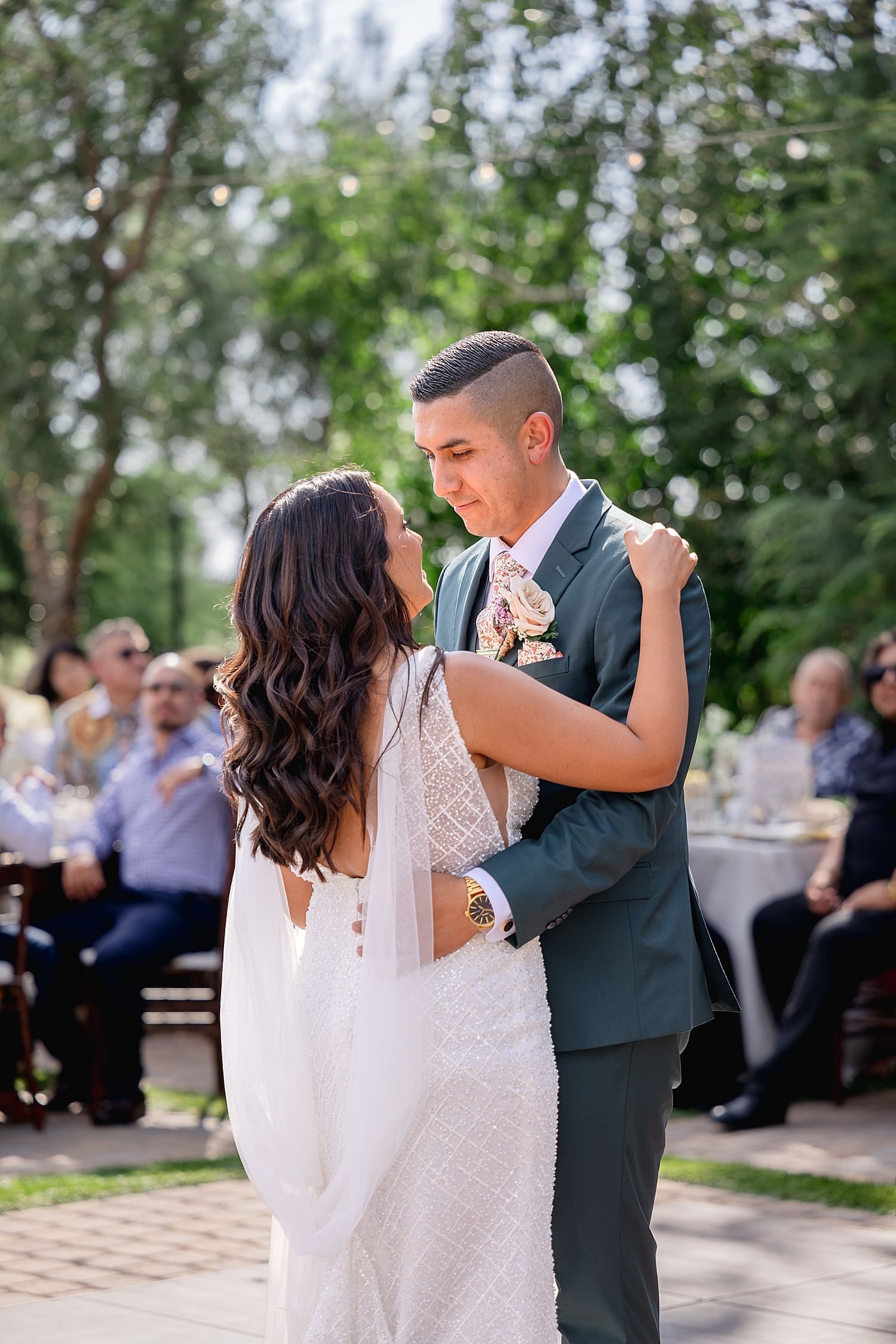 couple share a first dance on outdoor dance floor by Desiree Ashley Photography