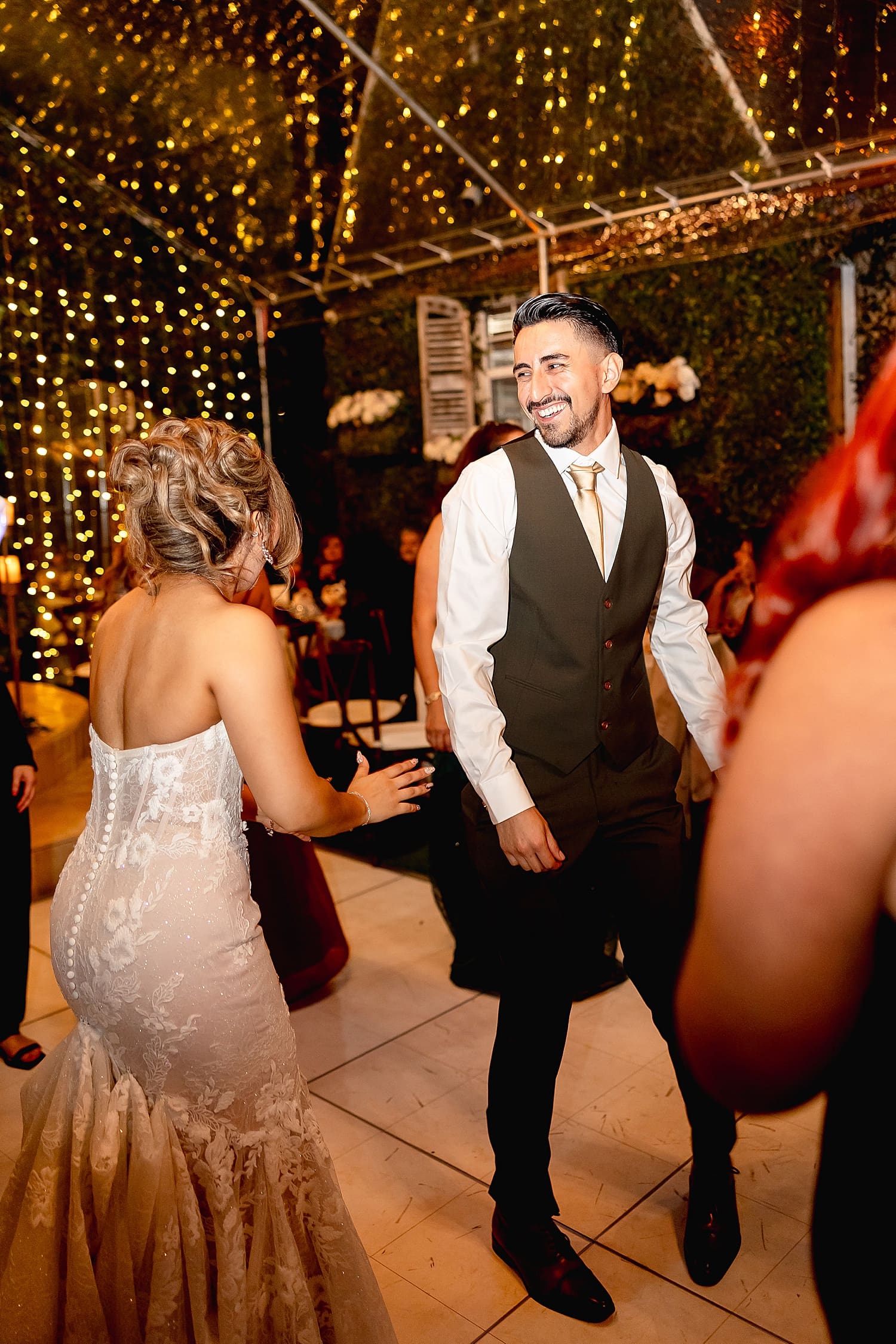 bride and groom dance at their wedding after planning their reception timeline